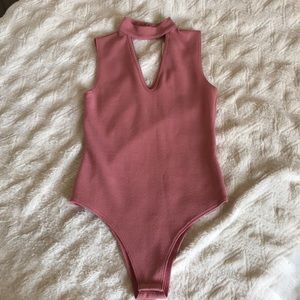 Pink body suit